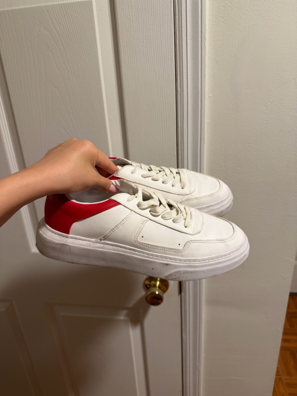 White Sneakers with Red Heel Accent